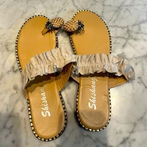 Sandals with pineapple toe loops!